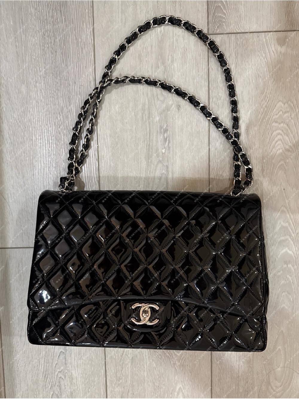 Chanel Black Quilted Patent Leather Jumbo Classic Flap Bag